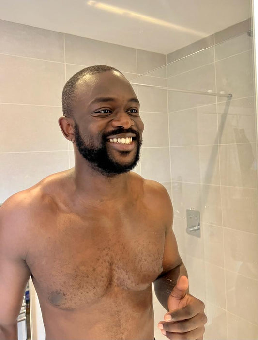 Body Moisturizers - black handsome man close up view