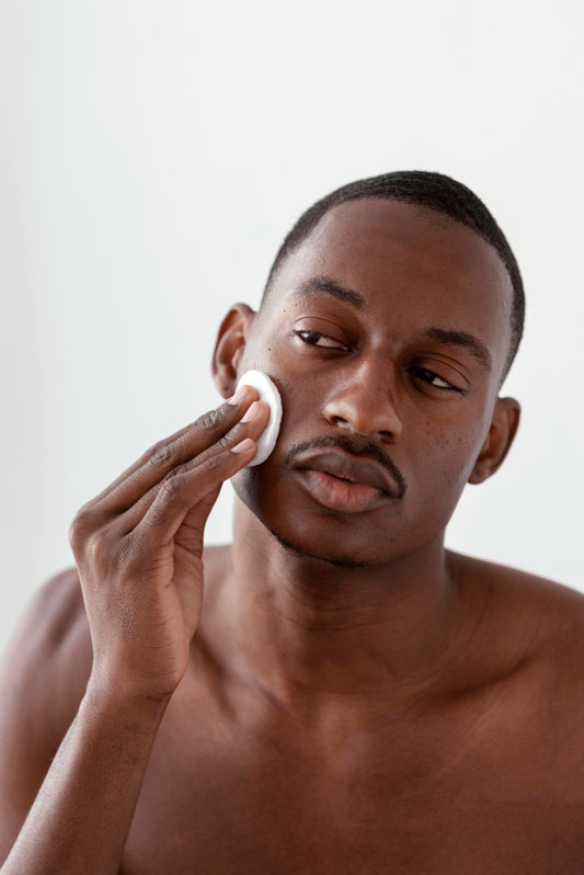 Gel Cleanser - close-up-man-cleaning-face